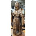 ***PLEASE NOTE AMENDED GUIDE*** A large continental lime wood figure of a Bishop,