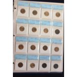 A collection of Farthings in a blue Coindex album.