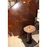 An early 19th Century tilt top rosewood veneered breakfast table