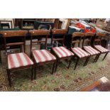 A harlequin set of eight early 19th Century mahogany dining chairs, all fitted with drop-in seats,