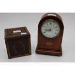 An Edwardian mahogany timepiece,