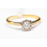 A solitaire diamond ring, with an illusion set brilliant cut diamond, approx diamond weight 0.