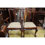 A set of six Chippendale style mahogany dining chairs,