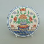 A Chelsea Derby Cut Out Plate Centre. Decorated with an Urn filled with Flowers.
