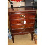 An Edwardian music cabinet, fitted with four drawers,