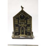 A Victorian metal money bank,