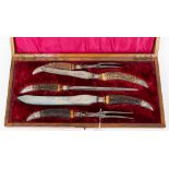 A boxed set - carving set, two knives, two forks and a steel, Victorian Harrison Bros & Howson,