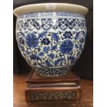 A large 19th Century Chinese blue and white jardiniere, Greek key border,