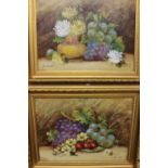 E...Chester (British, late 19th Century), still life studies of flowers and fruit, a pair, signed l.