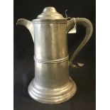 A large pewter dome lidded coffee pot