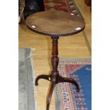 A George III mahogany tripod table,