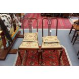 A pair of Edwardian mahogany side chairs