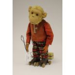 A 1960s Japanese battery operated, working, monkey, he walks backward and forward,