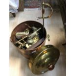 A copper and brass coal/log bucket with a part companion set