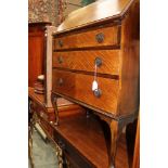 An early 20th Century mahogany bureau, having a fall front over three drawers,