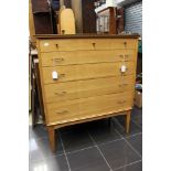 A mid 20th Century teak veneered part bedroom suite,