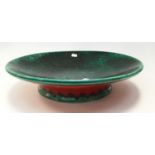 A 20th century Italian Art Pottery Charger in green/red glaze with pedestal horse