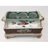 A 19th Century Continental porcelain ink stand, rectangular,