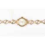 A 9ct gold cased Regency lady's wristwatch with oval link strap , total gross weight approx 9.