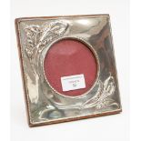 A silver Art Nouveau photograph frame made by William Neale with hallmarks for Chester 1905 with