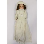 19th Century Florodora porcelain and leather doll