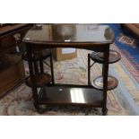 An early 20th Century oak drinks trolley,