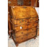 A Queen Anne style walnut bureau, or small proportions,