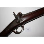 Percussion Cap Rifle marked "Mutzig" with 1853 dated barrel 102cm long. Overall length 140cm.