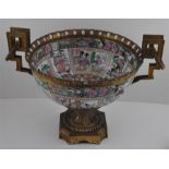 A Chinese 19th century Famille Rose porcelain ormolu mounted centrepiece.24cms high