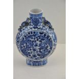 A 19th century Chinese porcelain moon flask.   Some firing flaws to glaze. 21cms high 15cms wide.