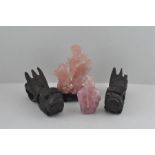 Two Chinese republic period pink chinese quartz Guanyin carvings with a pair of Fo dogs.