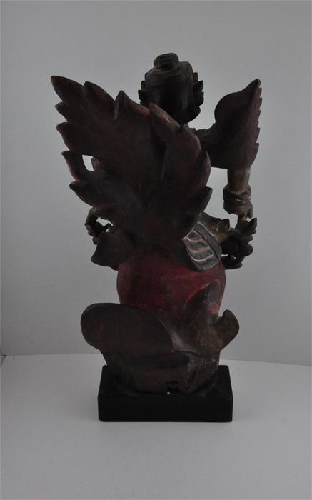 A Thai carved wood figure, early 19th century, having remains of polychrome decoration, raised - Image 3 of 4
