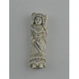 A Japanese late Meiji period carved ivory netsuke, of a standing female woman with fan carrying a