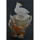 A Chinese agate water bottle and cover, carved as leaf and vine with bird stopper, height 11 cm,
