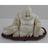 An Chinese republic period alabaster laughing Buddha on stand. approx. 15 x 12cms