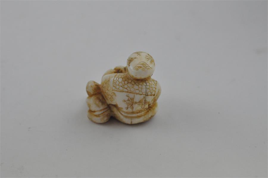 A Japanese Meiji period carved ivory netsuke, of parent and child, signed, height 2.7 cm. - Image 3 of 6