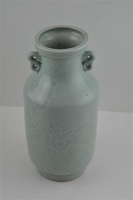 A Chinese celadon vase, republic period, having twin handles with impressed prunus blossom - Image 3 of 6