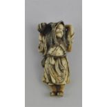 A fine quality Japanese Meiji period netsuke, of a man carrying a playing monkey to the back of