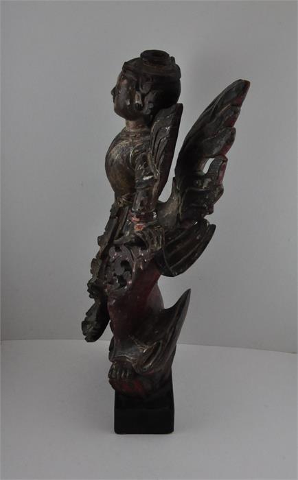 A Thai carved wood figure, early 19th century, having remains of polychrome decoration, raised - Image 2 of 4