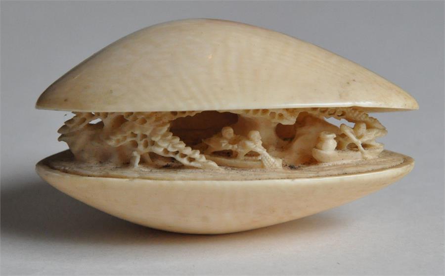 A Japanese Meiji period carved ivory okimono of a mussel, late 19th century, the interior of the - Image 2 of 7