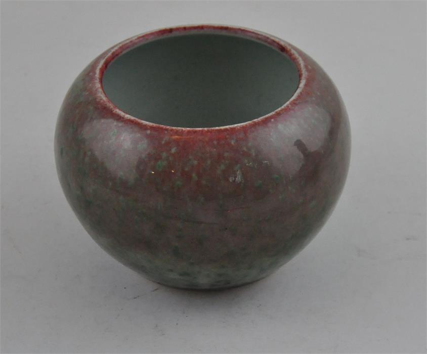 A Chinese high fired brush pot. Six character mark to base, probably 20th century. 8cms high.