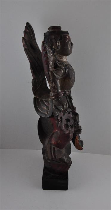 A Thai carved wood figure, early 19th century, having remains of polychrome decoration, raised - Image 4 of 4