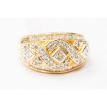 A 14k yellow gold and diamond ring,