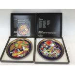 A boxed pair of Rosenthal Aladdin Collectors plates devised by Bjorn Wiinblad (2)