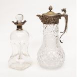 A silver plated mounted "cluck-cluck" glass decanter,