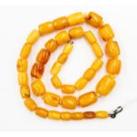 An amber type bead necklace,