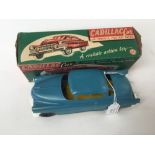 Marx: A boxed Cadillac Friction Drive Car, 'A realistic action toy with Powerful Friction Motor',