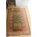 An early 20th Century hand knotted Turkish Dosemealti woollen rug