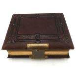 A Victorian embossed leather photograph album