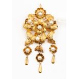 A Victorian yellow metal pendant, with brooch bar fastening, set with pearls,